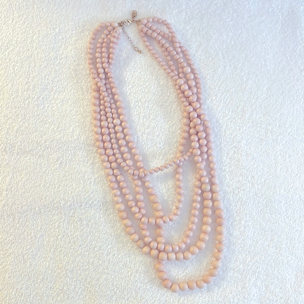 Pink layered beaded necklace.